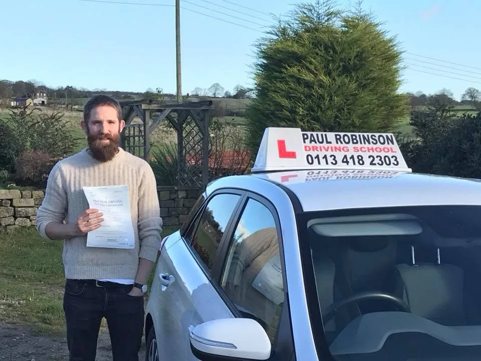 Adam Kingston after passing his driving test first time at Horsforth