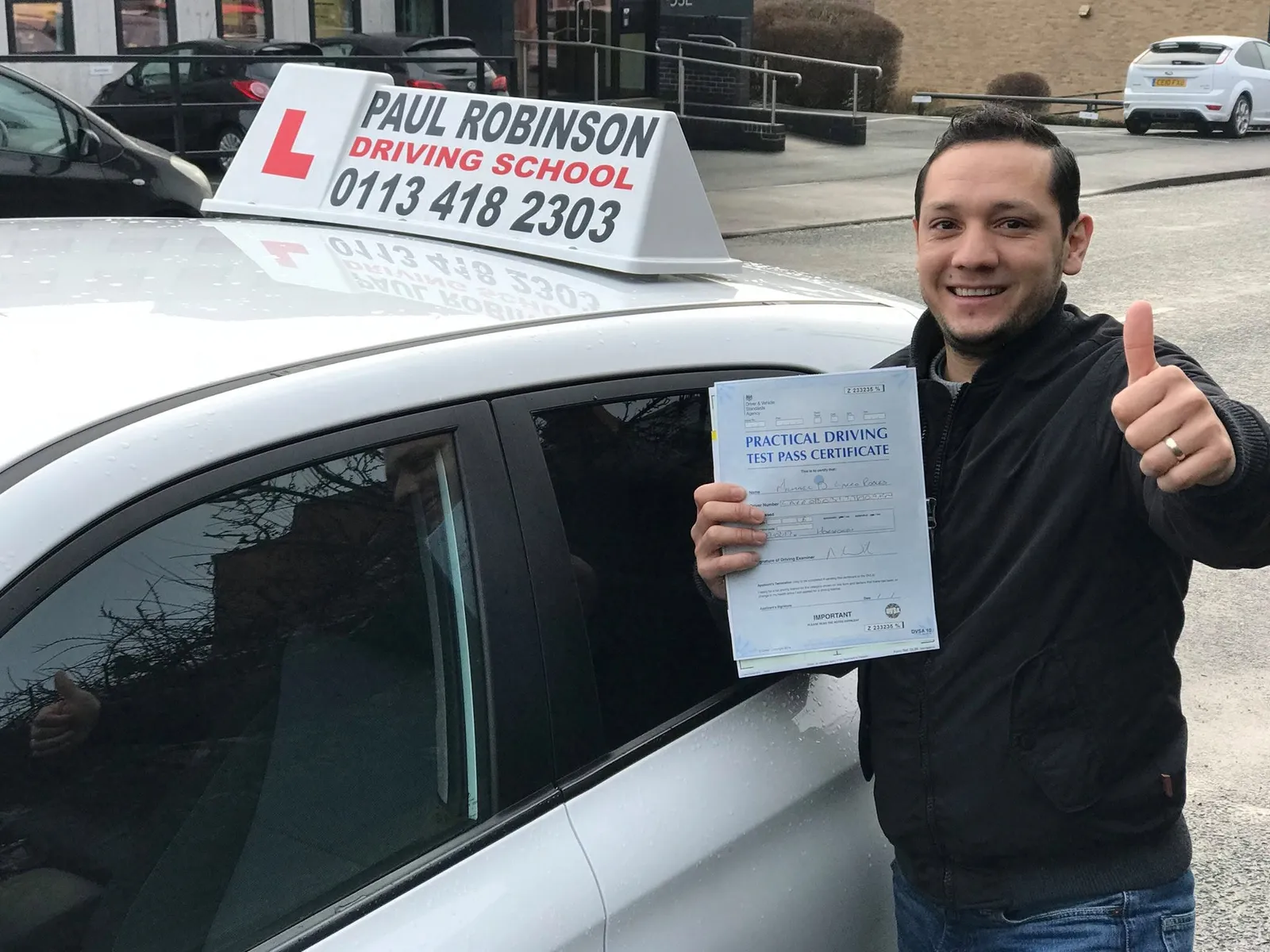 Michael after passing his UK driving test following preparation with Paul Robinson Driving School